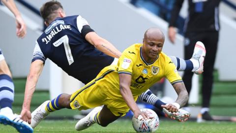 Andre Ayew is tackled by Jed Wallace