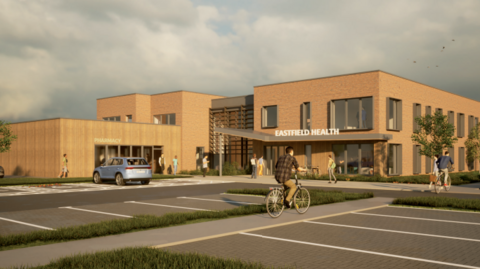 A computer generated image of what the two-storey brick GP surgery could look like, with a car parked outside of it and people walking and cycling outside it.