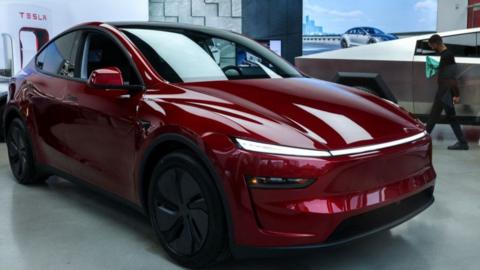 A 2025 Model Y Tesla vehicle is seen in a Tesla showroom in New York City on February 16, 2025.