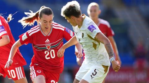 Wales' Carrie Jones (left) and Czech Republic's Aneta Polaskova (right) battle for the ball