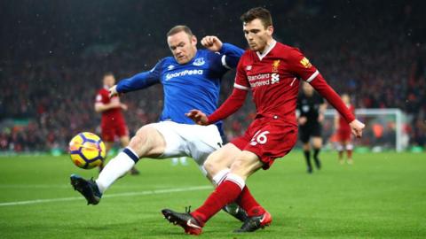 Wayne Rooney in action for Everton against Liverpool's Andy Robertson