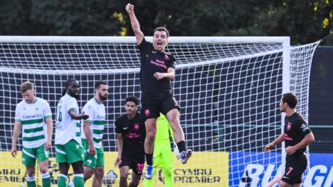 Rahman Dashdamirov jumps in celebration after scoring a second goal for Sabah against The New Saints