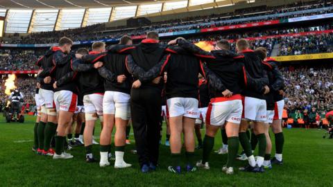 Wales in a huddle at the third Test against South Africa in Cape Town