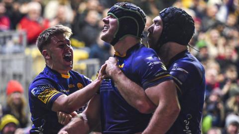 Justin Clegg celebrates scoring for Worcester