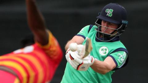 William Porterfield hits a boundary for Ireland against Zimbabwe on Monday
