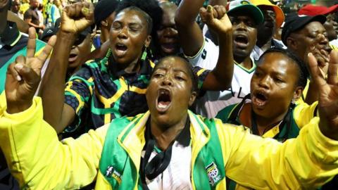 Delegates chant slogans during the 55th National Conference of the ruling African National Congress (ANC) at the Nasrec Expo Centre, in Johannesburg, South Africa December 19, 2022