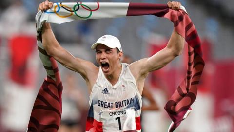 Joe Choong celebrates winning the modern pentathlon