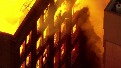 Flames engulf a large building in Sydney