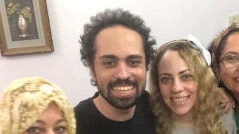 Shadi Abu Zeid (centre) with his family