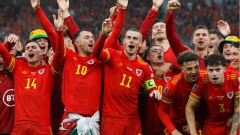 Wales celebrate their win over Ukraine to qualify for the World Cup