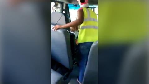 Indiana school bus driver with child.