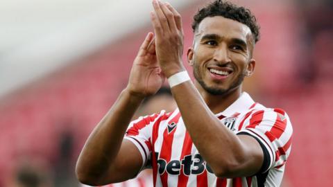 Jacob Brown claps to the crowd after Stoke's victory