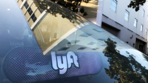 Lyft logo reflected in windscreen