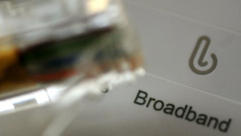 Close up of a broadband router and cable