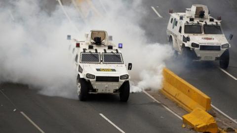 National Guard vehicle sprays tear gas