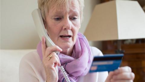 Woman with bank card