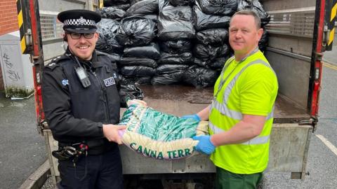 Police hand over compost