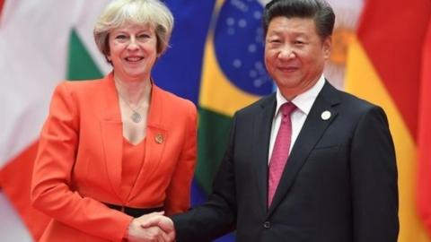 Theresa May and Chinese premier Xi Jinping