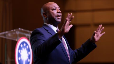 South Carolina Republican Senator Tim Scott speaks to a crowd.