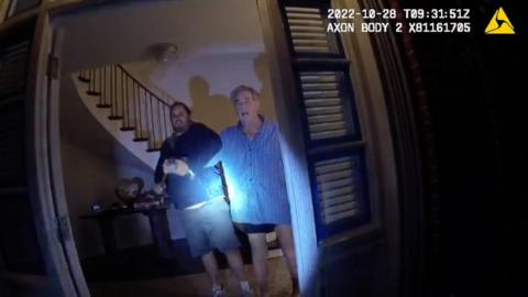 Still of bodycam footage showing Paul Pelosi and his alleged attacker