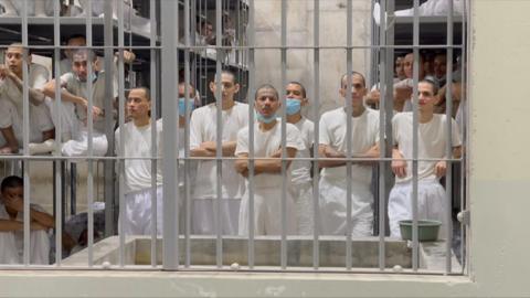 A large group of inmates in a prison cell in El Salvador megaprison