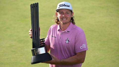 Australia's Cameron Smith poses on the 18th green with the winner's trophy on the final day of the LIV Golf Invitational Series event at The Centurion Club