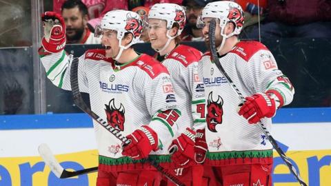 Justin Crandall celebrates with Cardiff Devils team-mates