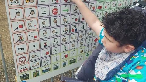 Cohen using language board