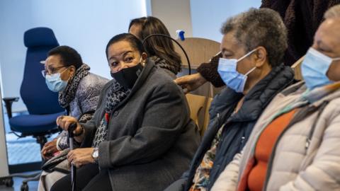 Five Congolese mixed-heritage women sit in a Belgian court. Photo: 14 October 2021