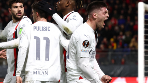 Luka Jovic celebrates scoring for AC Milan against Rennes in the Europa League