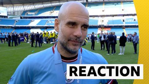 Pep Guardiola reacts to Manchester City winning their third successive Premier League title.