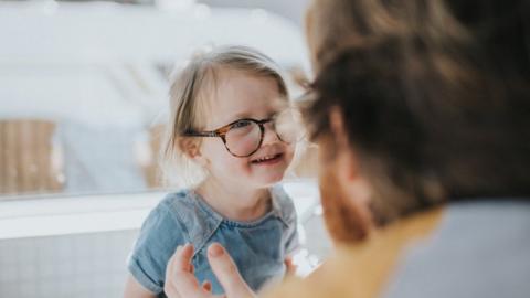 Girl seeing an opticians