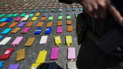 Colombian antinarcotics police, guard a one-ton shipment of cocaine seized from Usuga Clan August 10, 2017.