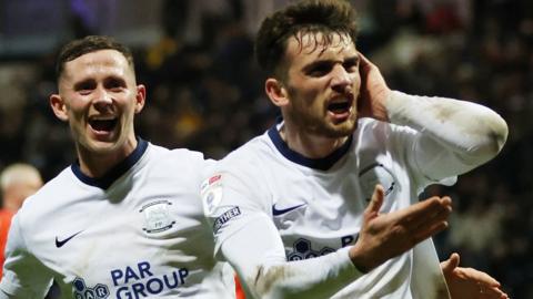 Troy Parrott (right) celebrates scoring Preston's equaliser from the penalty spot