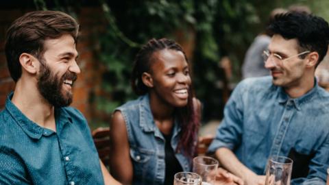 Young friends chatting outside