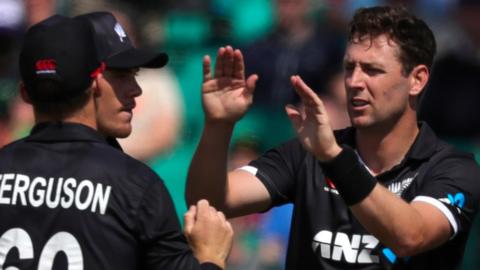 Matt Henry celebrates taking the wicket of Andy McBrine