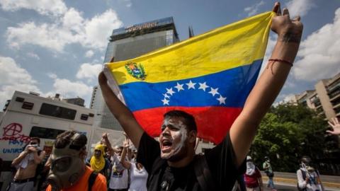 People participate in a protest against the Venezuelan Government in Caracas, Venezuela, 06 April 2017.