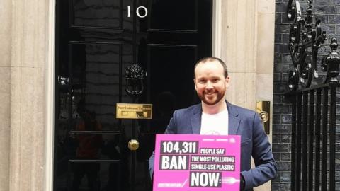 A man standing in front of No.10 Downing Street