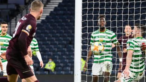 Hearts' Stephen Kingsley scores against Celtic