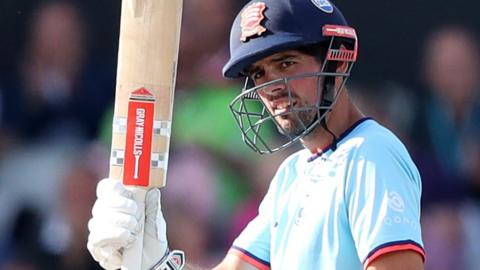 Alastair Cook celebrates his century for Essex