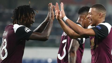 Moise Kean and Kylian Mbappe