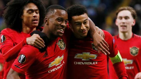 Jesse Lingard (right) celebrates scoring