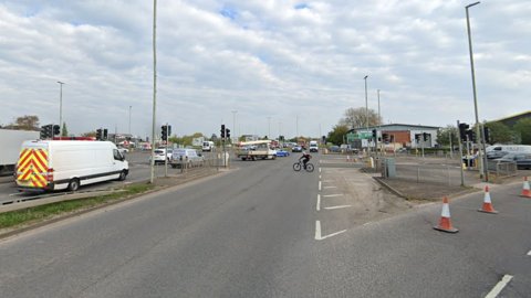 A wide shot of traffic at the junction of the A38 and Cole Avenue in Gloucester