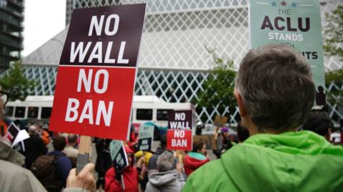 People protest outside 9th US Circuit Court of Appeals over US President Donald Trump's revised travel ban in Seattle, Washington on May 15, 2017