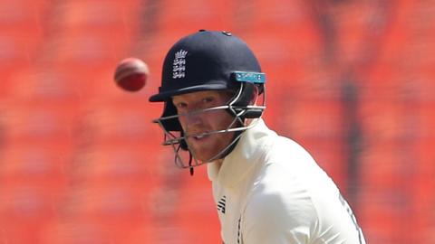 England batsman Ben Stokes watches the ball after playing a shot on day one of the final Test against India