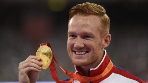 Greg Rutherford with his Olympic gold medal
