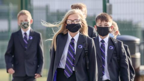 School children wearing masks