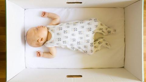 Baby asleep in baby box