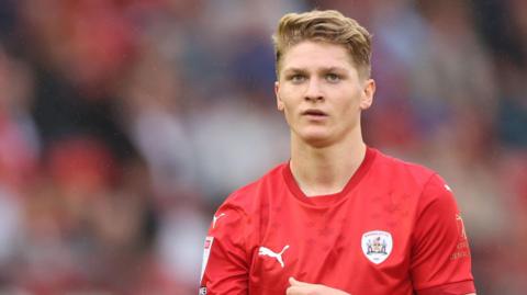 Matthew Craig in action for Barnsley.