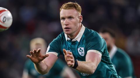 Ciaran Frawley receives a pass while playing for Ireland